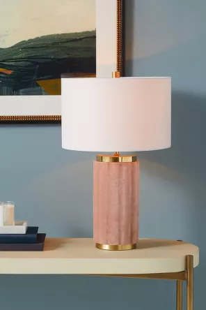 Pink velvet desktop lamp with gold finishes and a white lamp shade