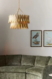 Gold chandelier with a feather shaped lamp shade