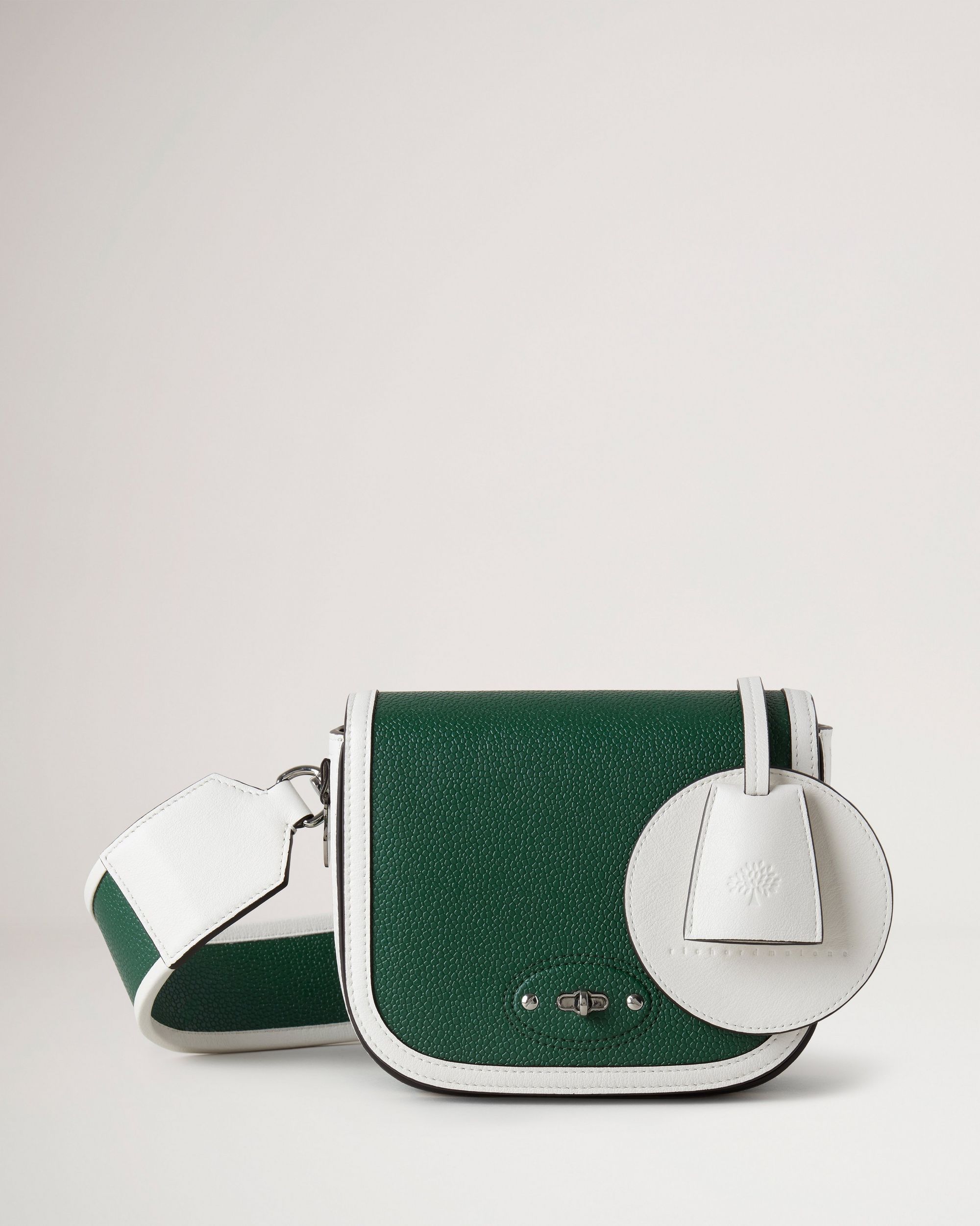 Miniature green luxury handbag