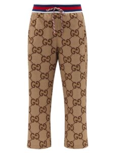 Cute aesthetic luxury brown patterned women’s Gucci joggers with red and navy waistband