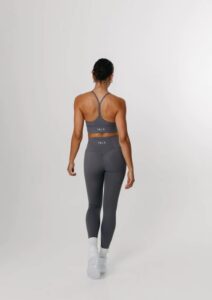 Grey tight fitting workout leggings for women.