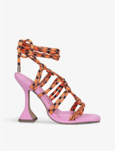 Designer pink tie up shoes with orange and black laces