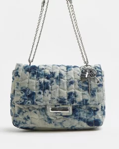 Blue denim tie dye handbag with long silver chain handles