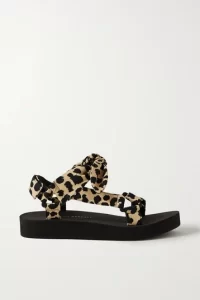 Leopard print strap sandals with a black sole.