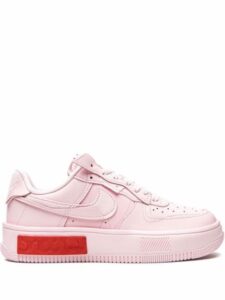 Baby pink sneakers with tick for women.