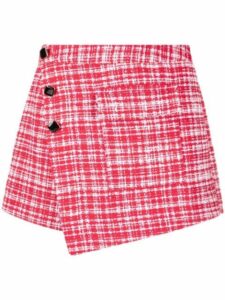 Red and white patterned women’s shorts with black buttons