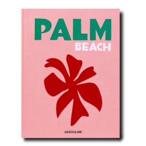 Pink coffee table book with red palm tree abstract art on cover