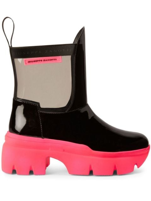 Black and fluorescent pink winter wellies