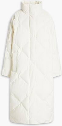 Off white coat from Stand Studio.