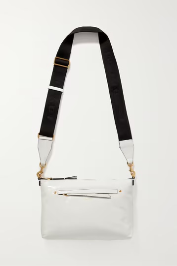 White shoulder bag with black strap