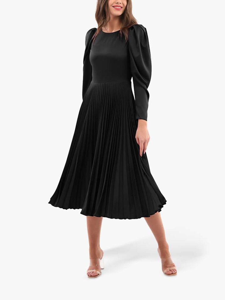 Black midi dress with puffy sleeves.
