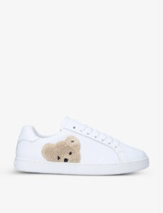 White trainers with fluffy teddy bear on it