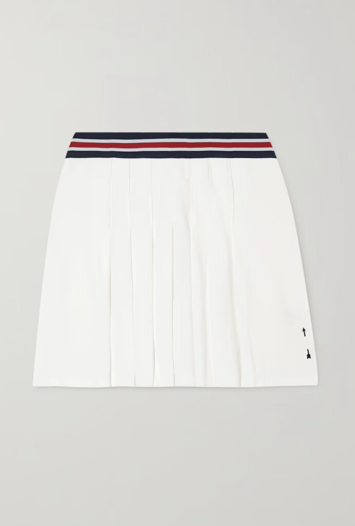 Pleated tennis skirt with red and navy stripes.