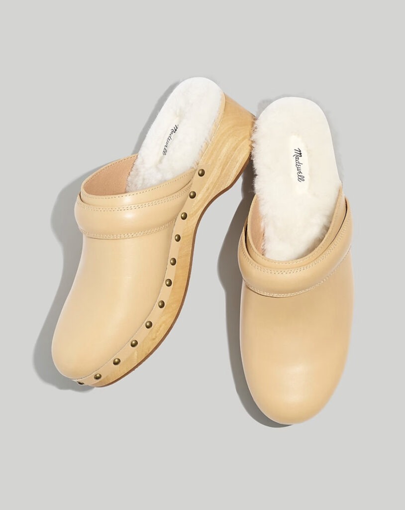 Women’s cream clogs lined with shearling.