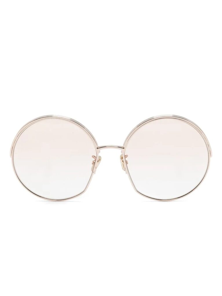 Gold round sunglasses for women by Dior.