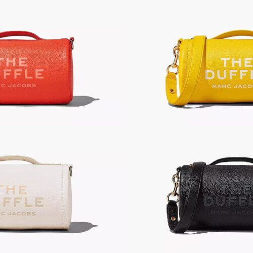 Collection of duffle bags from Marc Jacobs in orange, yellow, white and black.