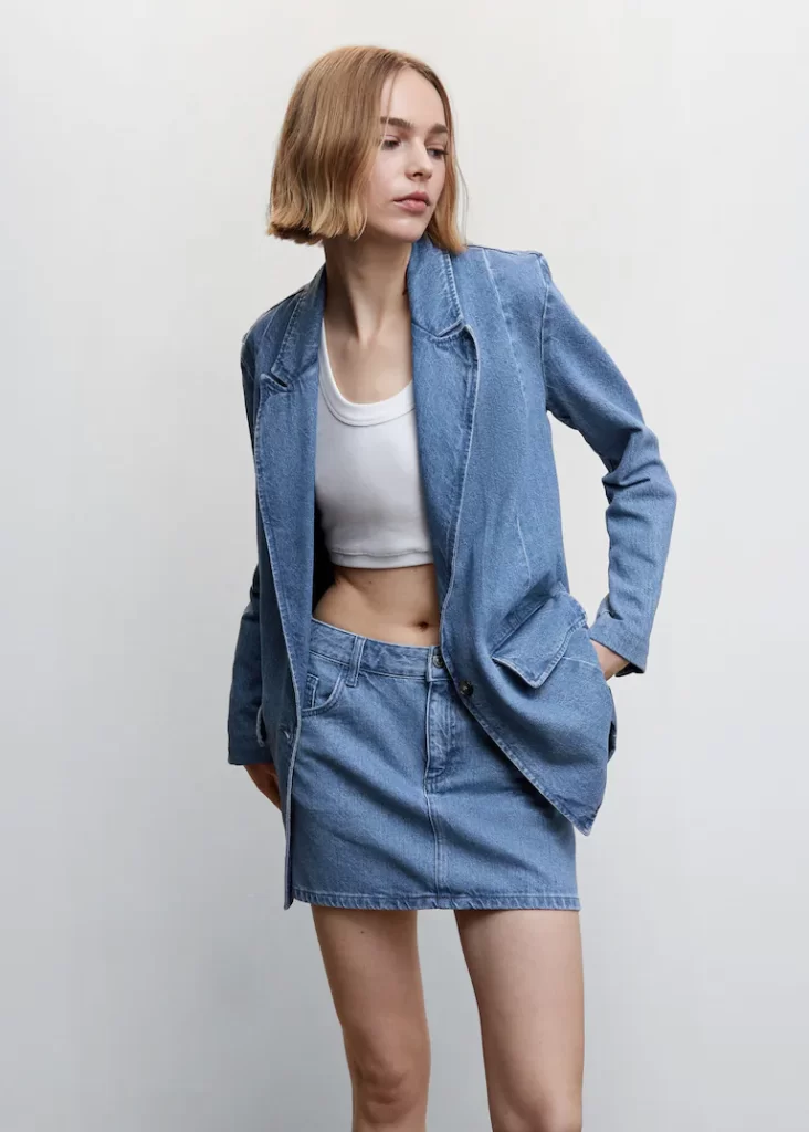 Medium blue denim mini skirt from Mango