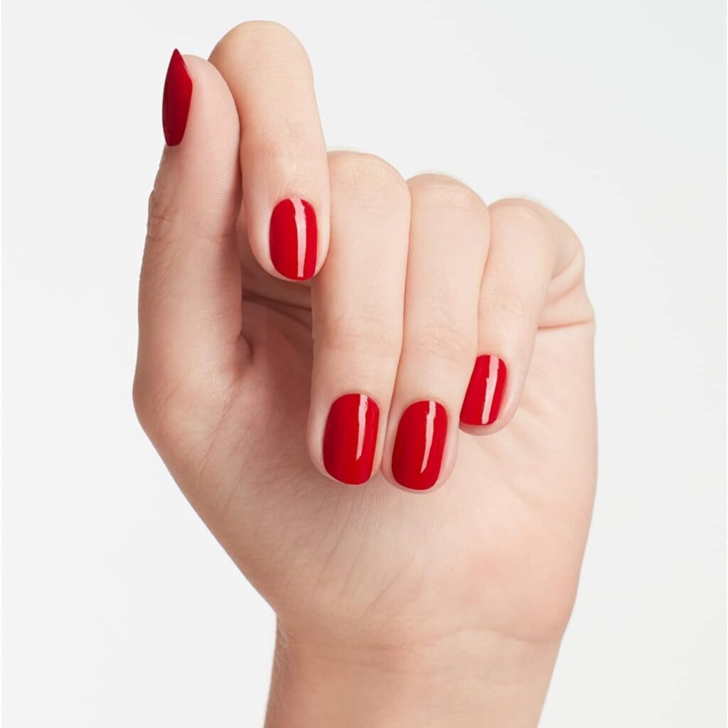 Nails with big apple red nail polish
